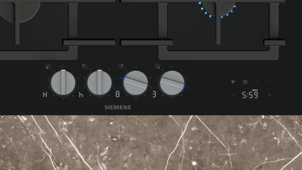 Siemens gazlı ocak, dört kontrol düğmesi ve 5:59 dijital ekranlı.