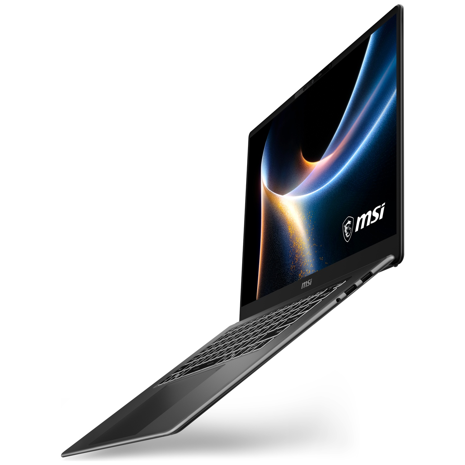 An open, slim, dark laptop with the MSI logo displayed on the screen.