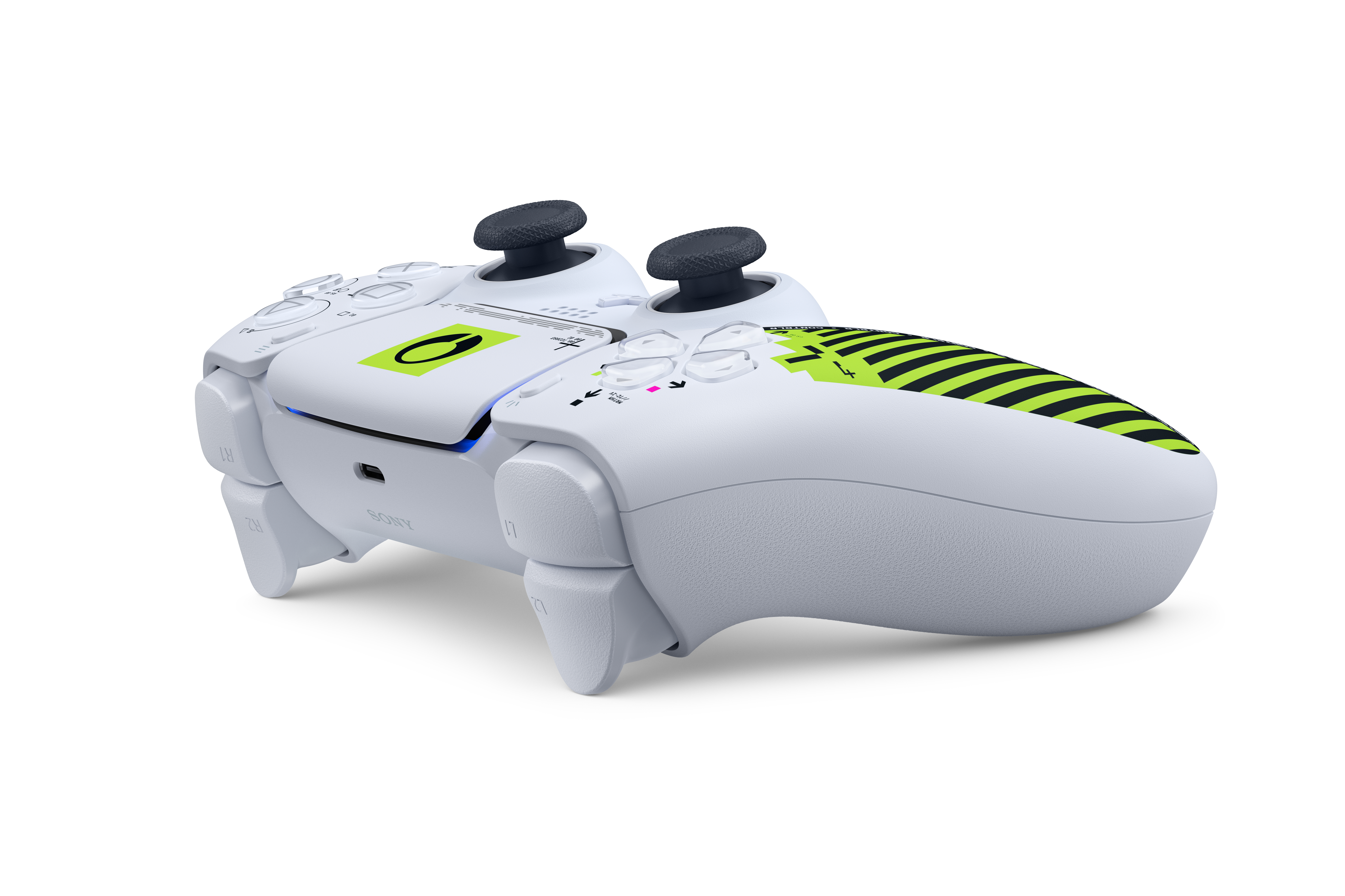 Ein weißer Controller mit grünen und schwarzen Streifen und Symbolen.
