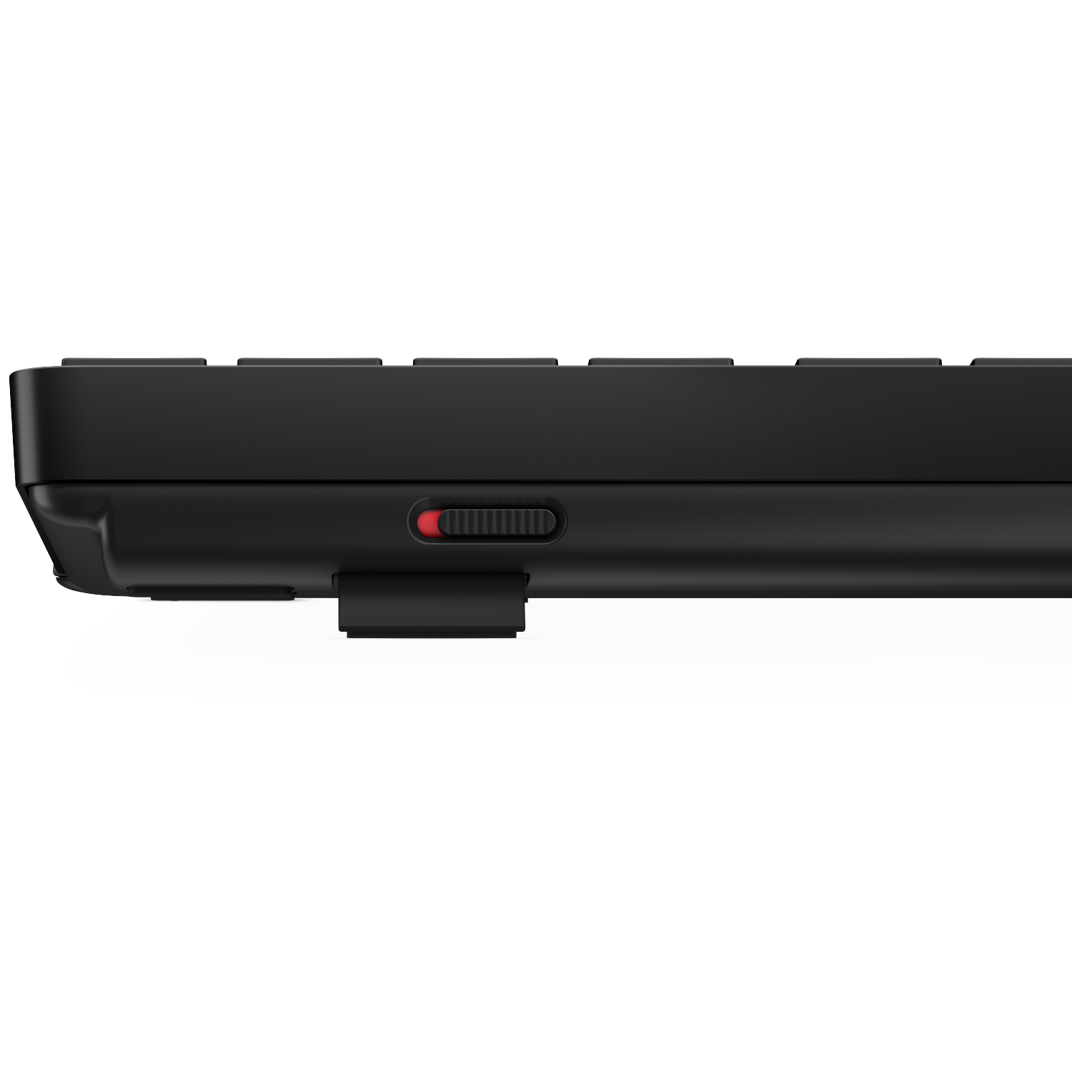Black keyboard side with red slider switch and black plug.