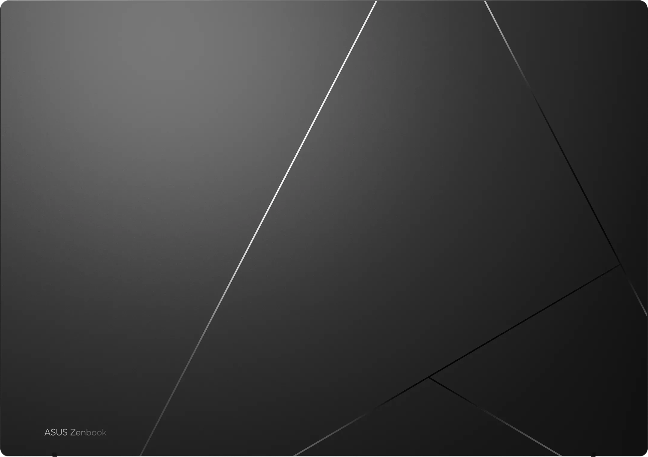 Szürke háttér ezüst vonalakkal és ASUS Zenbook logóval.