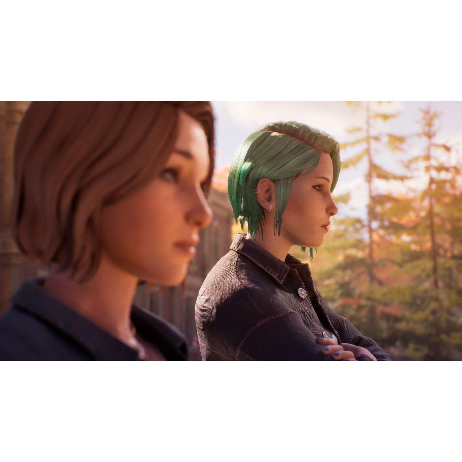 Twee vrouwen, één met bruin haar, één met groen haar, kijken naar rechts.