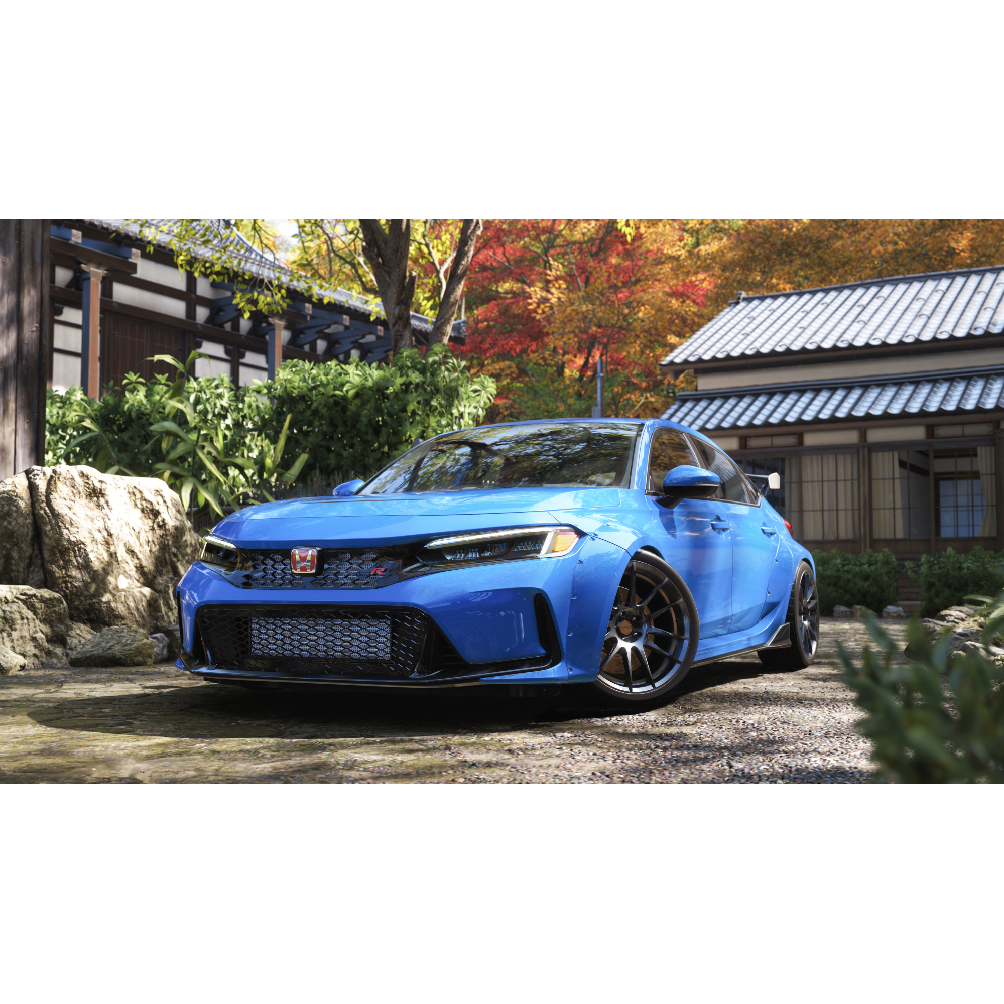 Une voiture de sport bleue garée devant une maison japonaise traditionnelle avec feuillage d'automne.