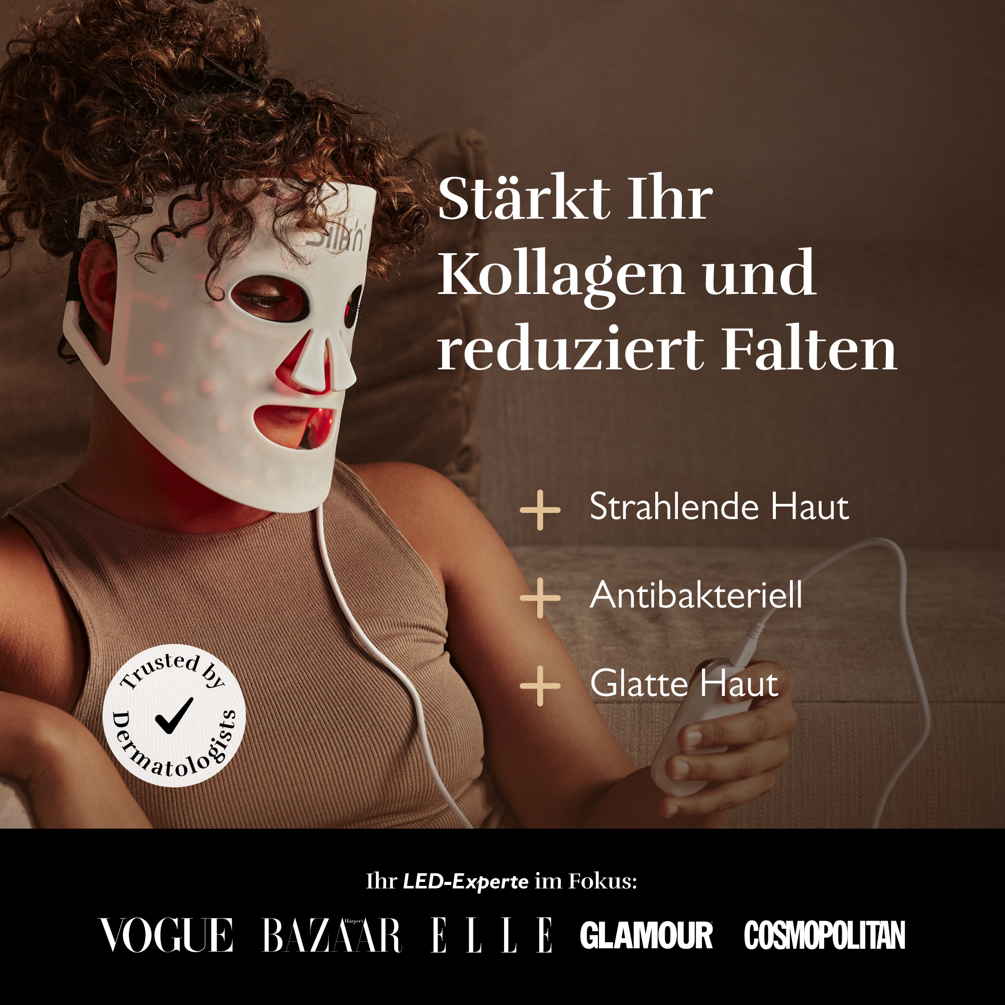 Frau trägt weiße LED-Maske, die Kollagen stärkt und Falten reduziert.