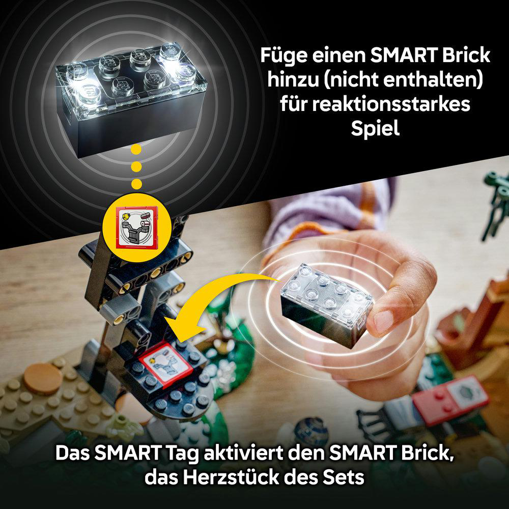 Ein SMART Brick mit Lichtern wird von einer Hand gehalten. Ein gelber Pfeil zeigt auf eine Konstruktion.