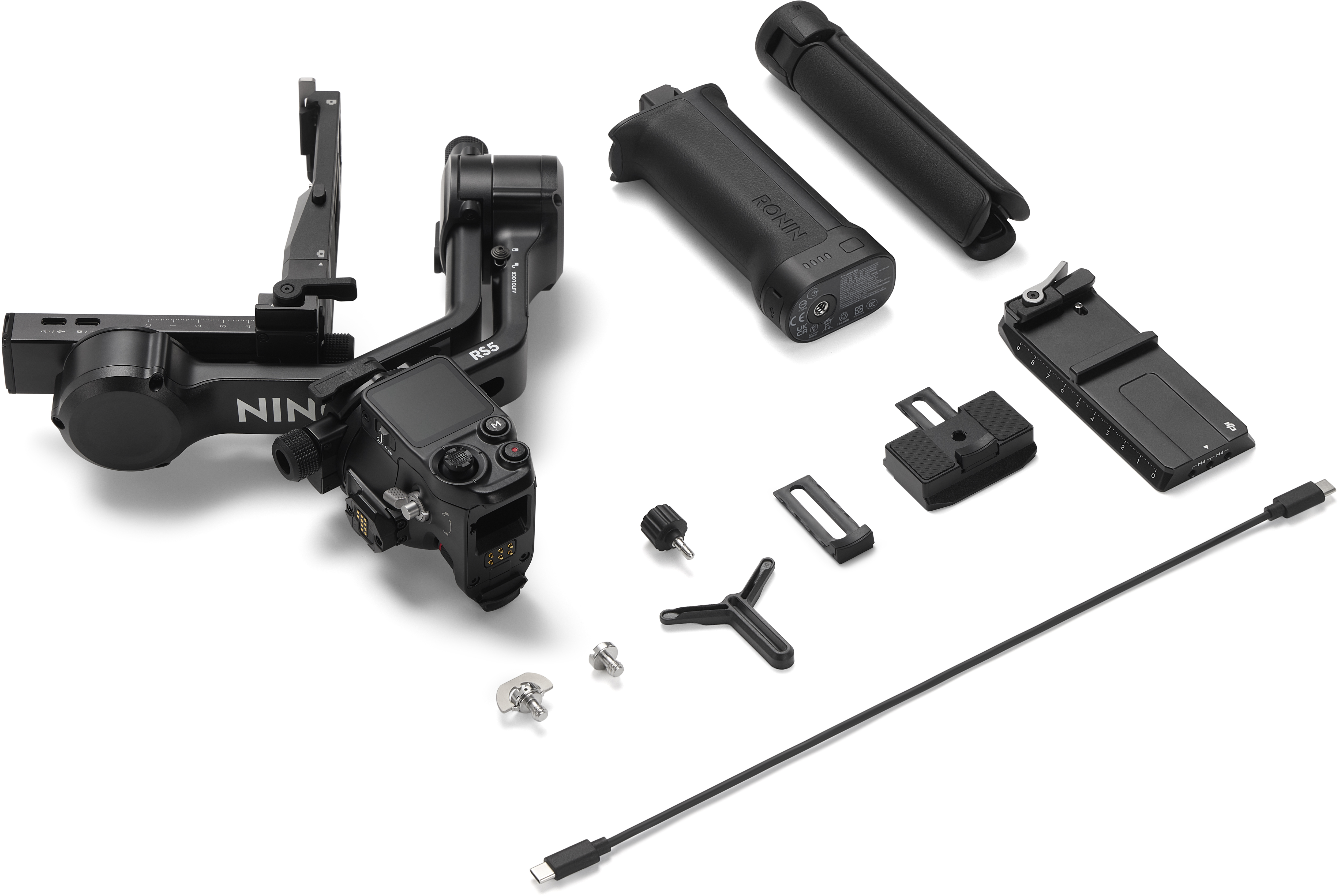 Gimbal DJI RS5 noir avec accessoires, poignées, câbles et pièces de montage.