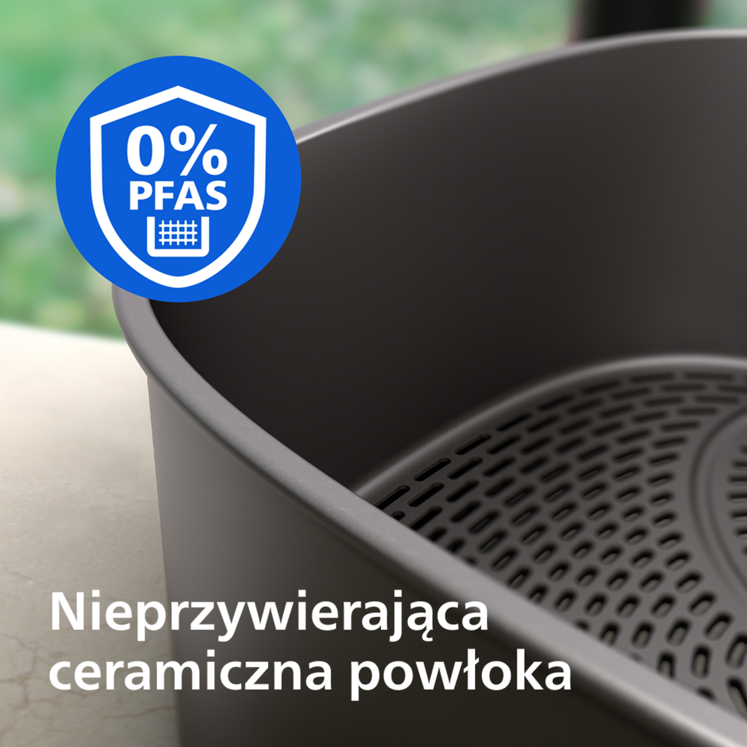 Frytkownica z pieczęcią 0% PFAS i napisem powłoki ceramicznej.