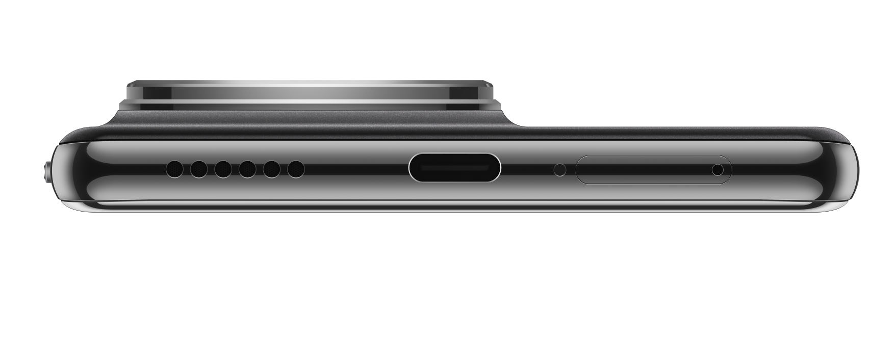 Zbliżenie na dolną krawędź smartfona, pokazujące port ładowania i kratki głośnikowe.