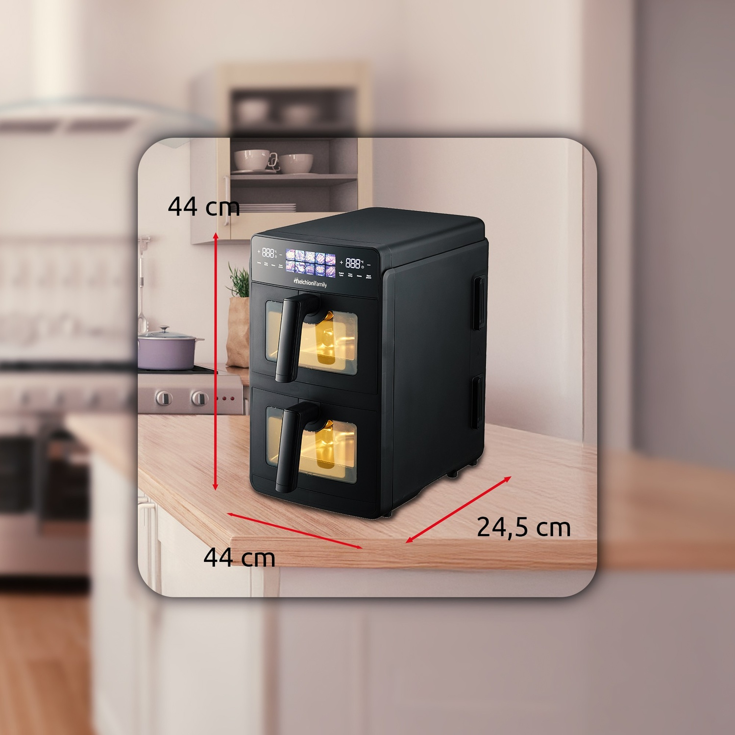 Forno friggitrice ad aria nero a doppio cassetto su un bancone da cucina.