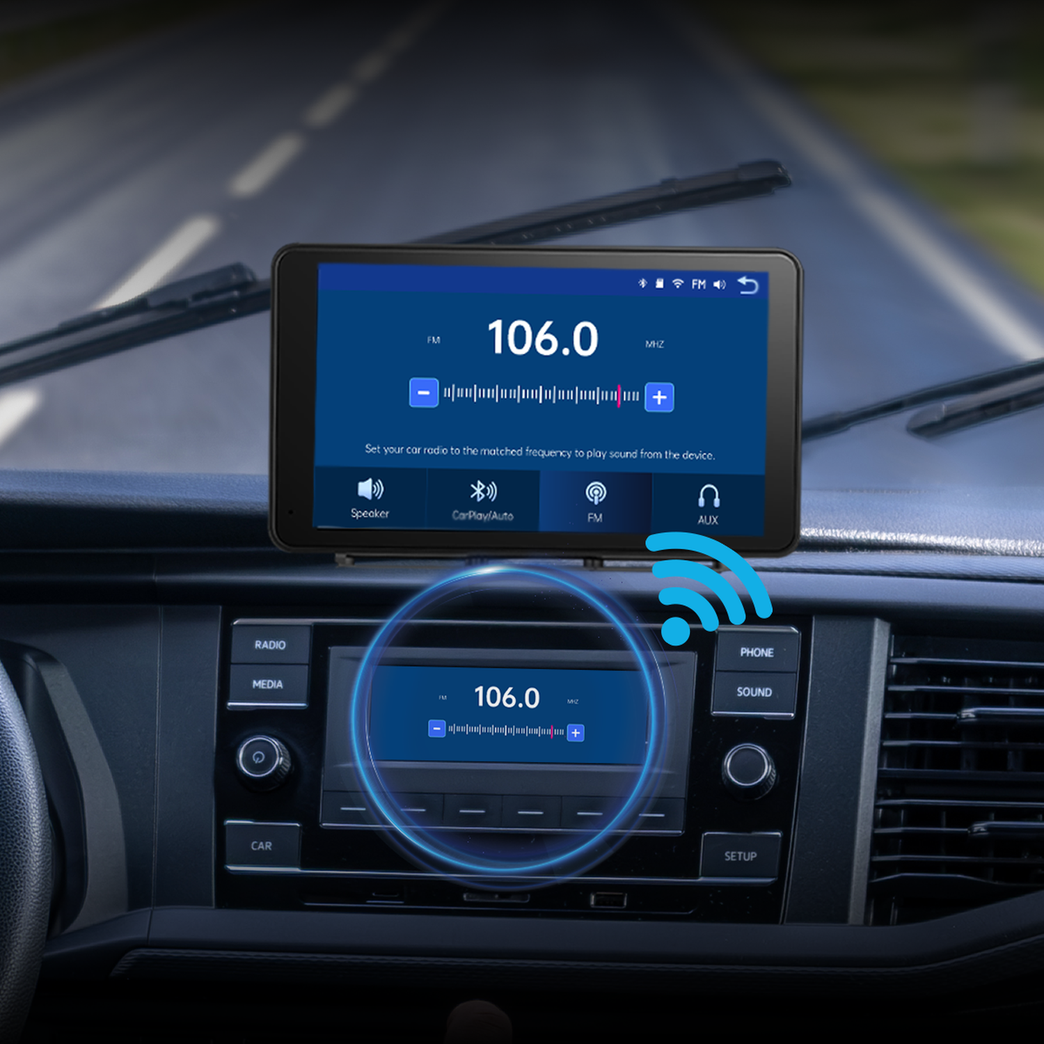 A car radio display shows FM 106.0 MHz. A smartphone is mounted.