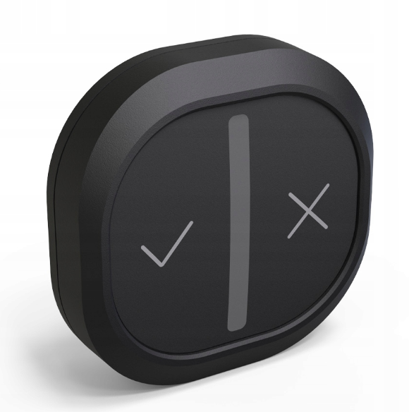 Czarny okrągły przycisk ze znakiem wyboru i krzyżykiem.
