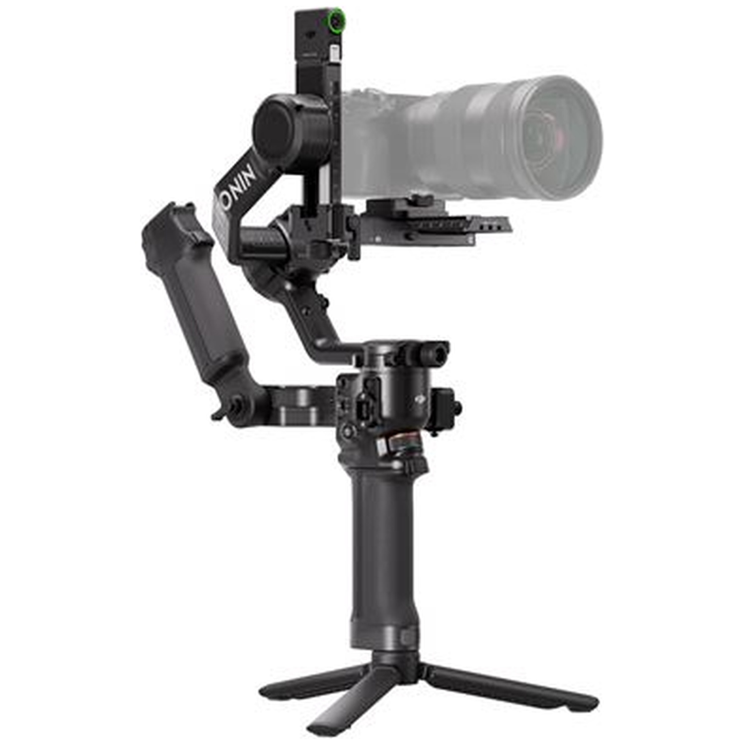 A black camera gimbal with a lens in the background on a white surface.