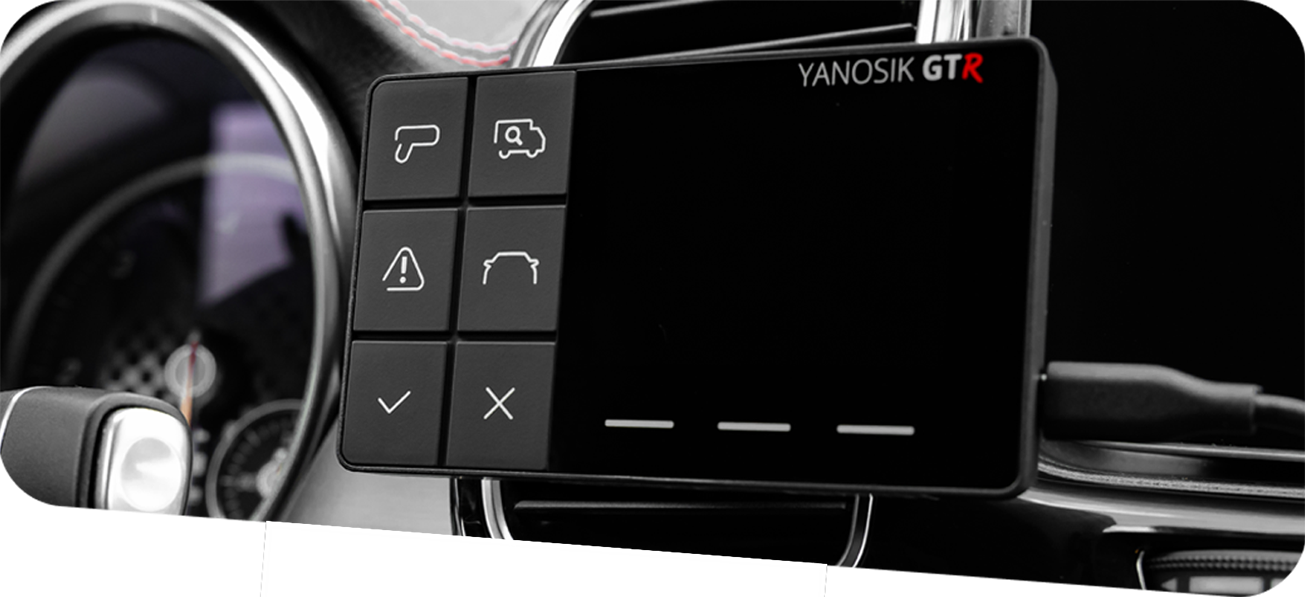 Czarny gadżet YANOSIK GTR z przyciskami i ekranem w samochodzie.