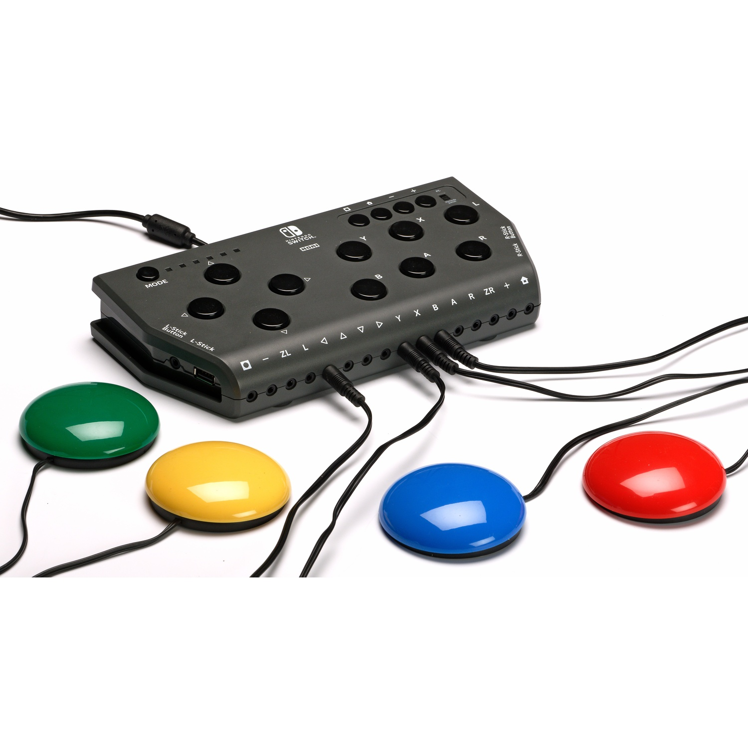 Un controller nero Nintendo Switch con quattro pulsanti rotondi colorati: verde, giallo, blu e rosso.