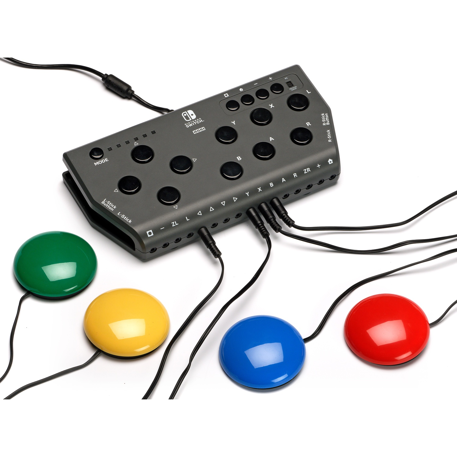 Un controller grigio Nintendo Switch con quattro pulsanti rotondi (verde, giallo, blu, rosso).