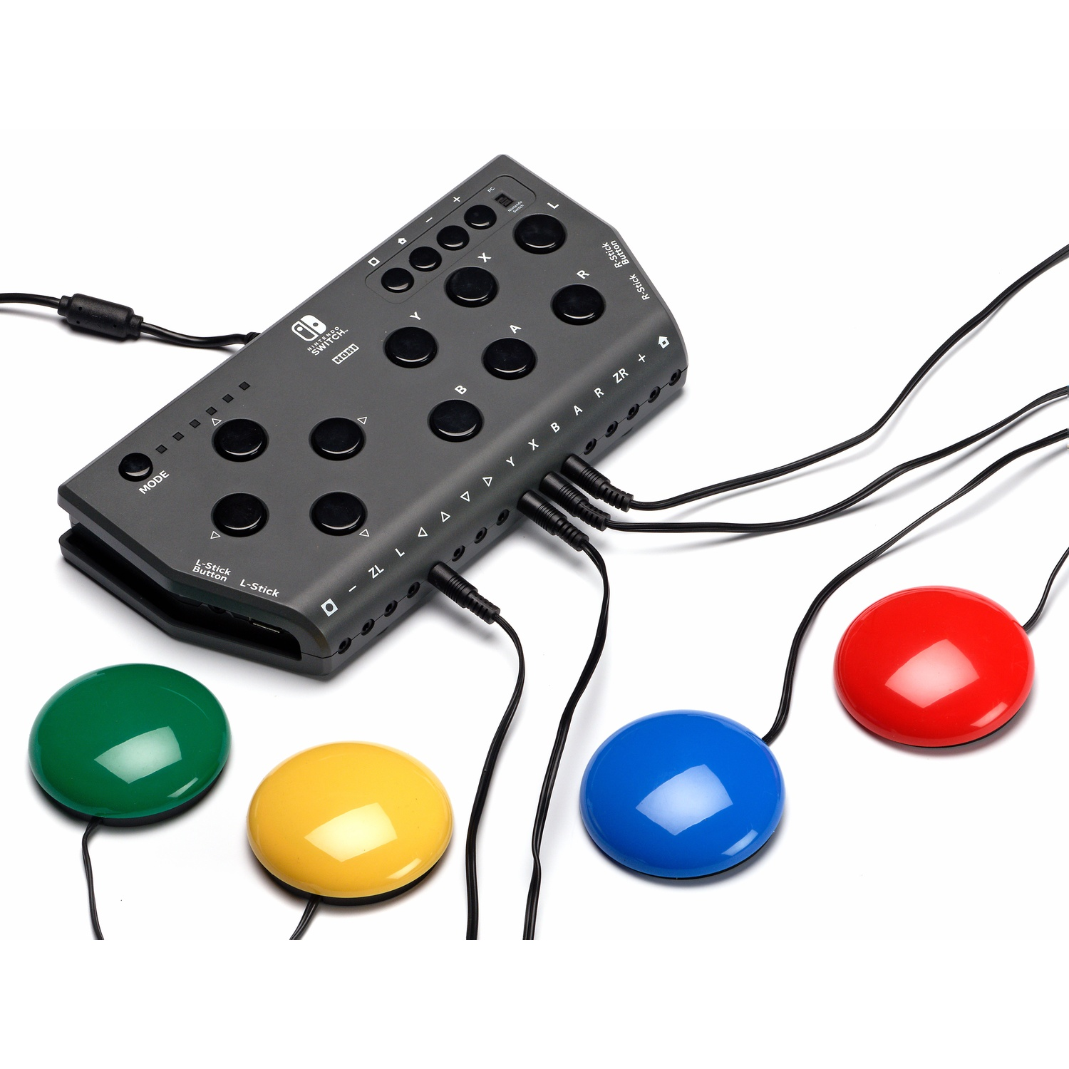 Un accessorio controller grigio Nintendo Switch con quattro pedali colorati: verde, giallo, blu e rosso.