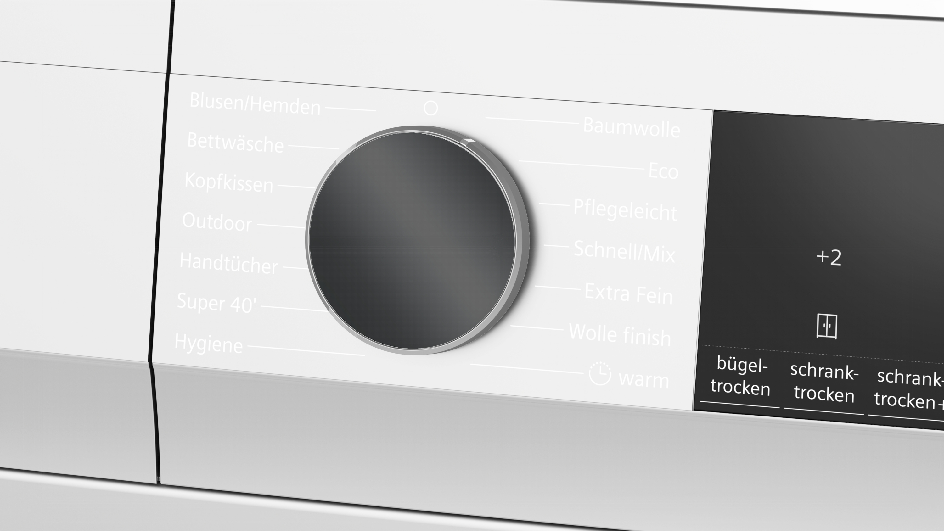 Nahaufnahme des Bedienfelds einer Waschmaschine mit Drehknopf und digitalen Anzeigen.