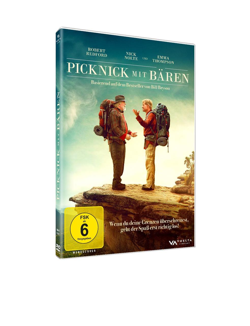 Zwei Männer mit Rucksäcken auf einem Felsen, DVD-Cover für 'Picknick mit Bären'.