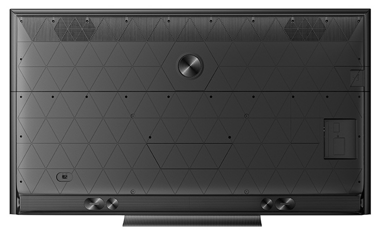 Tył czarnego telewizora z geometrycznym wzorem i portami.