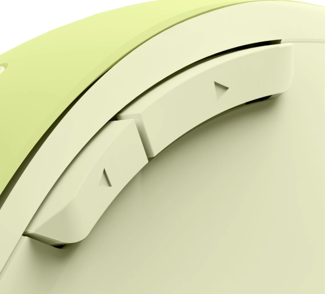 Zbliżenie jasnozielonej myszy komputerowej z dwoma bladymi beżowymi przyciskami.