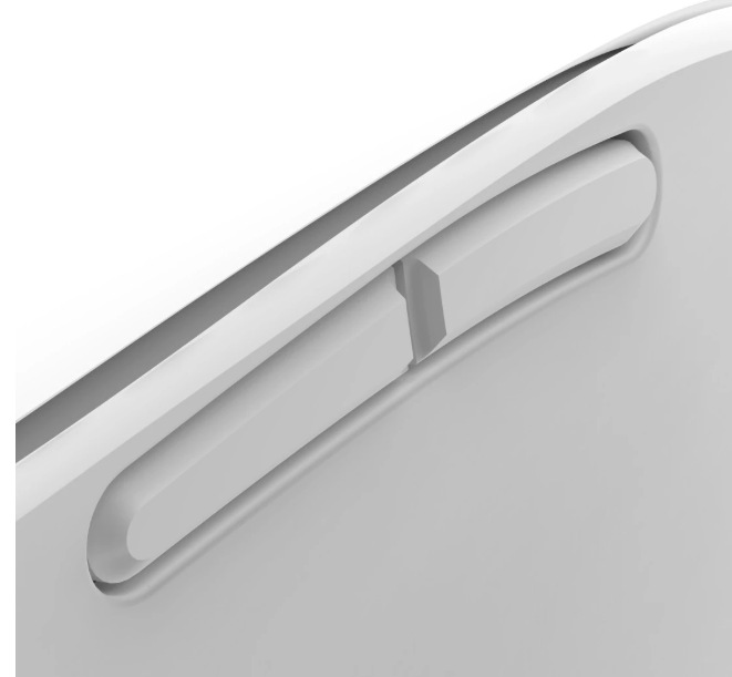 Zbliżenie białej krawędzi z wgłębieniem i białym przyciskiem w środku.