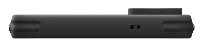 Czarny, prostokątny sprzęt z otworami wentylacyjnymi i dwoma małymi otworami.