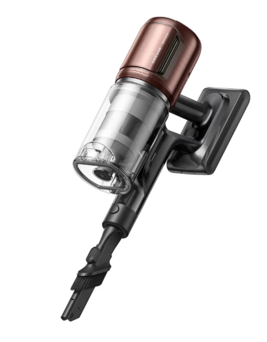 Przenośny odkurzacz w kolorze miedzianym i czarnym z przezroczystym pojemnikiem.