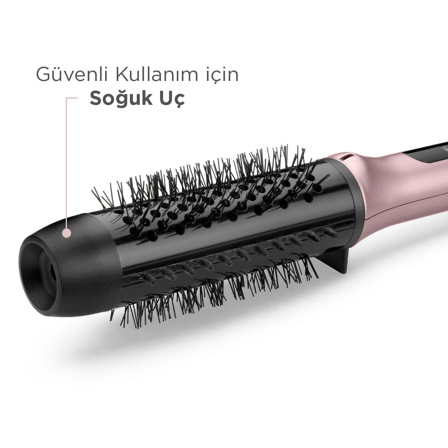 Siyah kıllı, rose gold saç kurutma makinesi fırça başlığı.