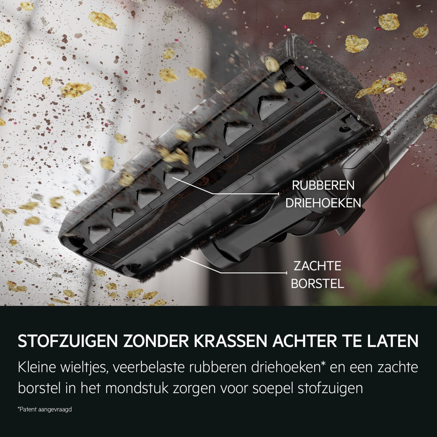 Vacuum cleaner nozzle with soft brushes and rubber corners picks up dirt.