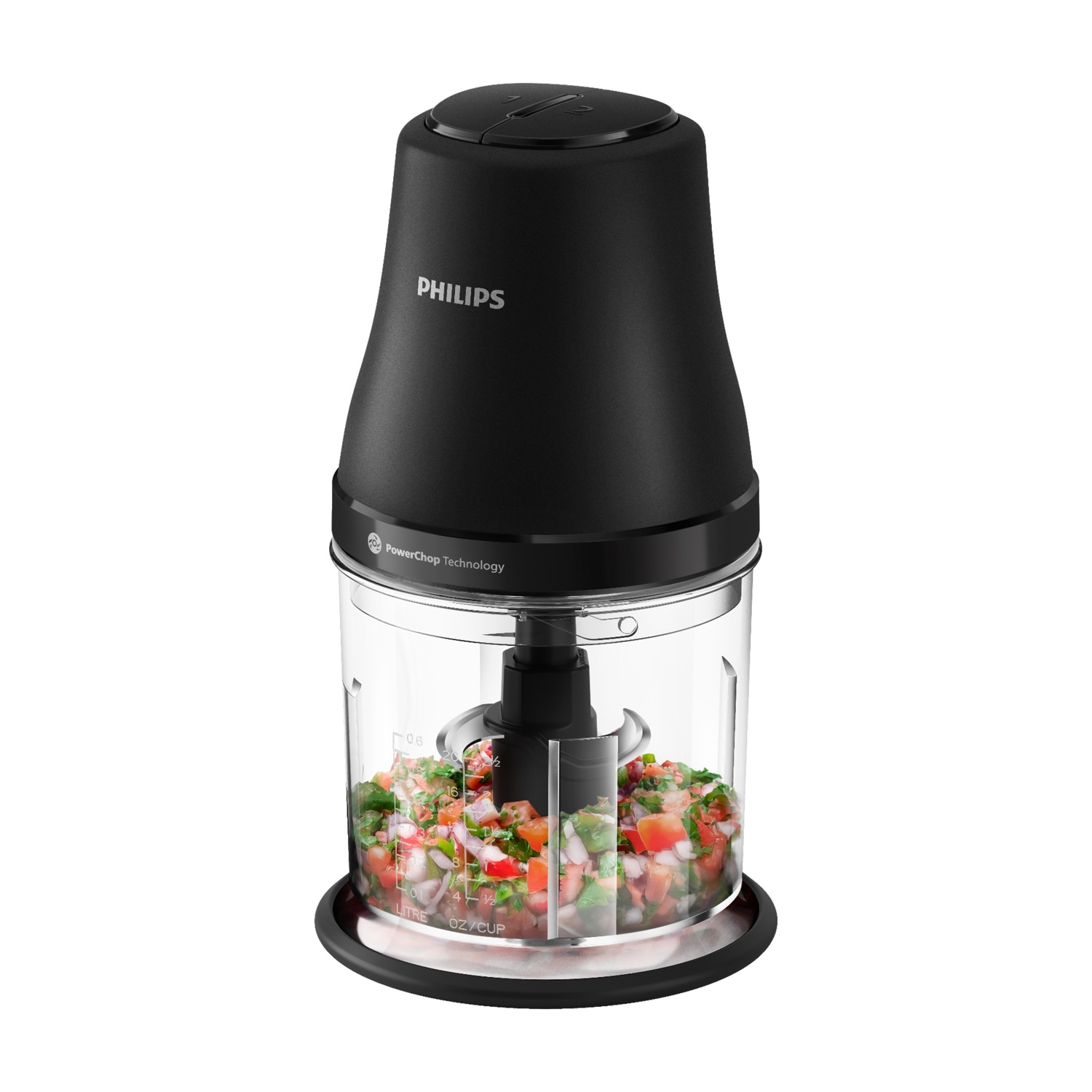 Un tritatutto Philips nero con verdure tritate nel contenitore.