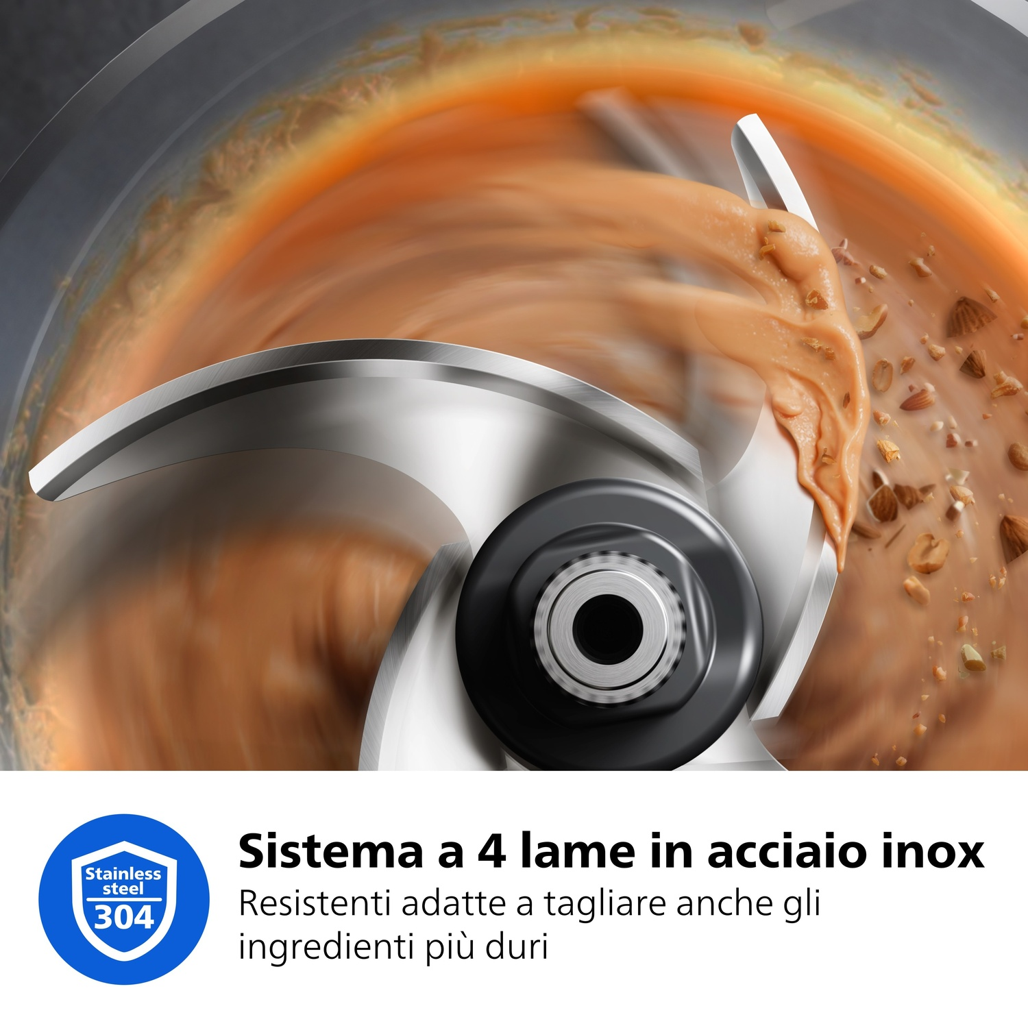 Primo piano di lame rotanti che lavorano burro di noci e noci.
