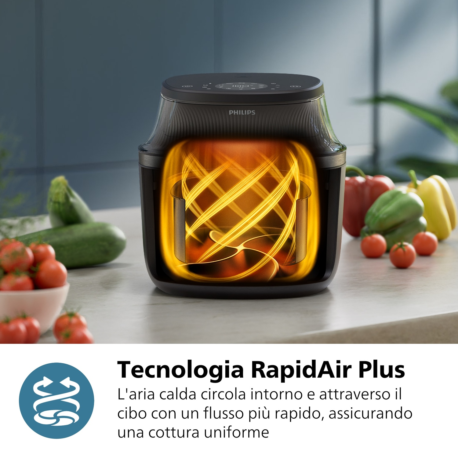Una friggitrice ad aria Philips nera con elementi riscaldanti luminosi e verdure.