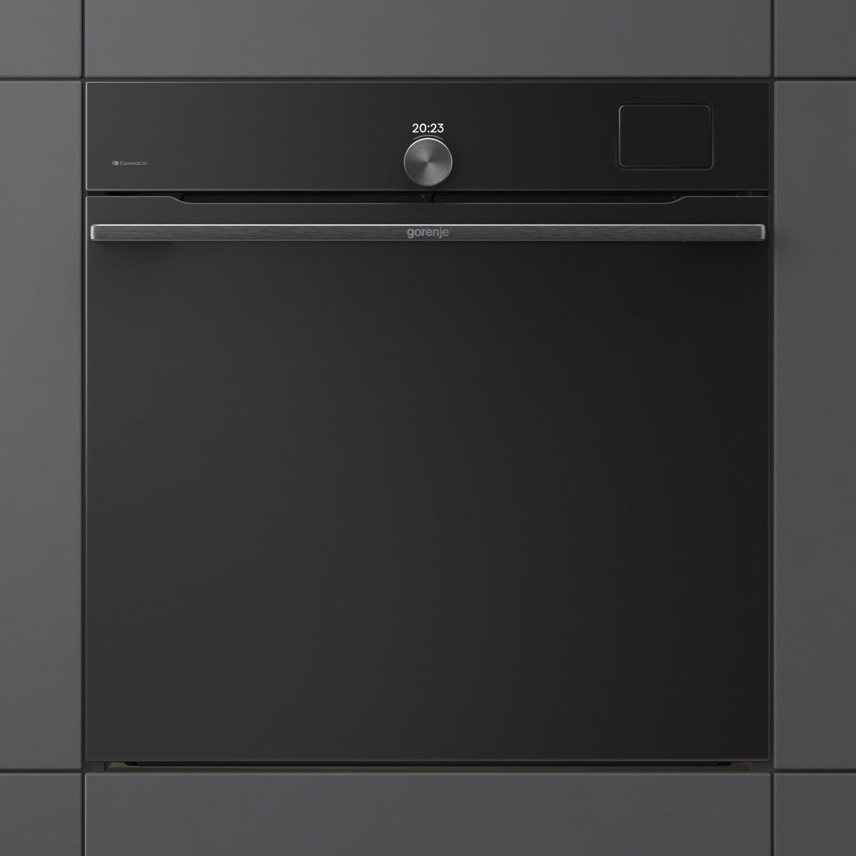 Ein moderner, schwarzer Einbaubackofen mit digitaler Anzeige und Chromgriff.