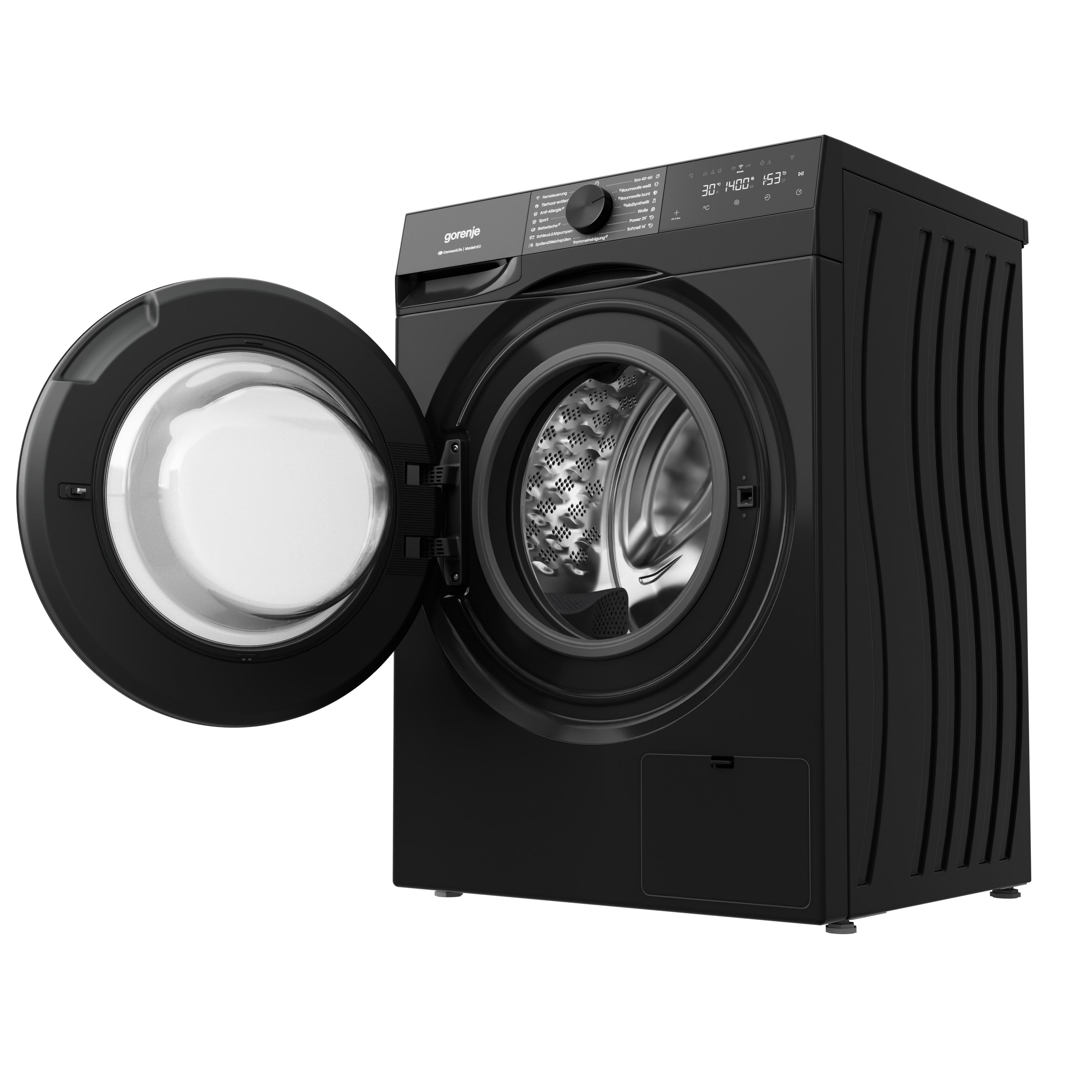 Schwarze Waschmaschine mit geöffneter Tür und Bedienfeld. Innenraum der Trommel sichtbar.