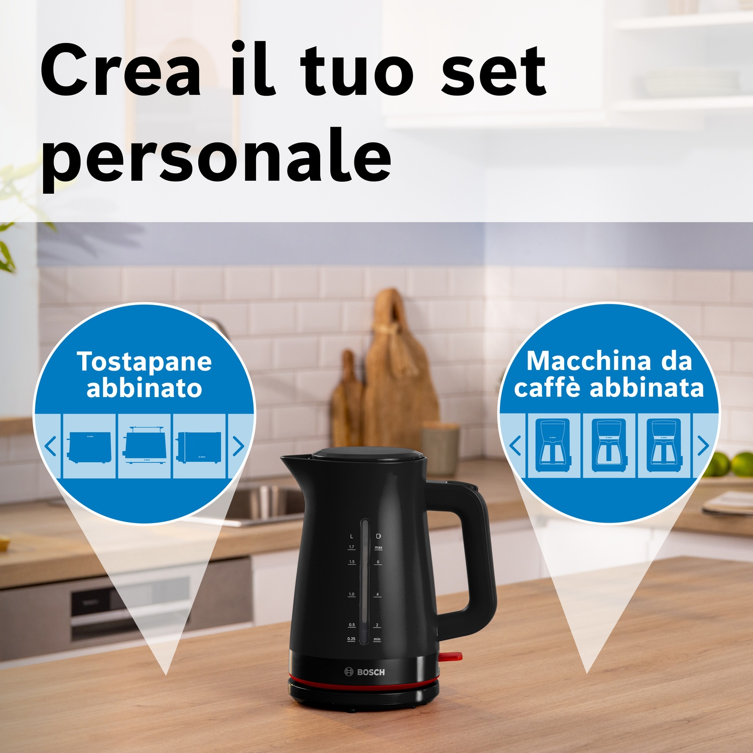 Bollitore nero con accenti rossi, mostra tostapane e macchine da caffè abbinate.