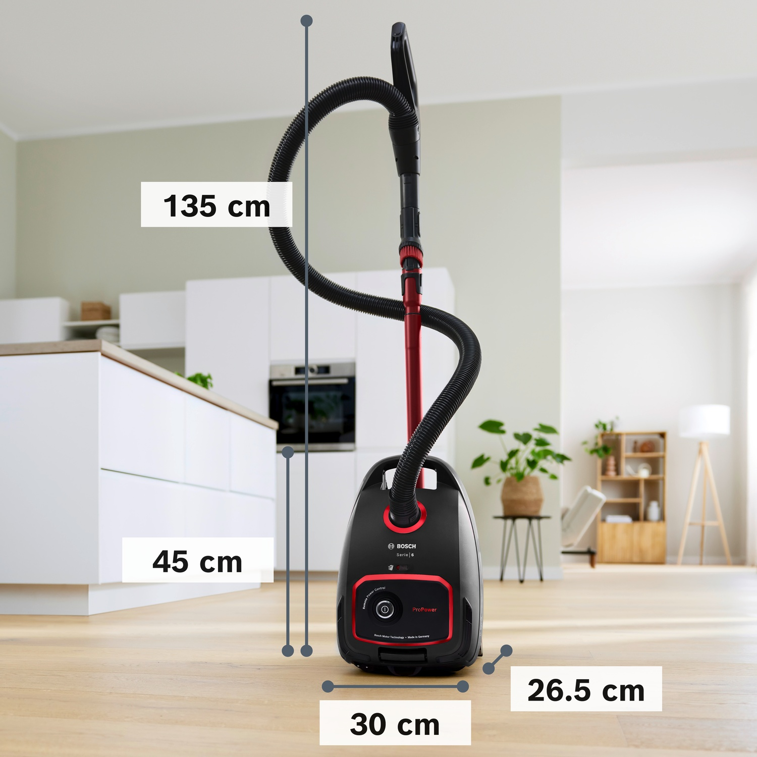 Aspirapolvere Bosch nero con accenti rossi, AxLxP 135x30x26,5 cm.