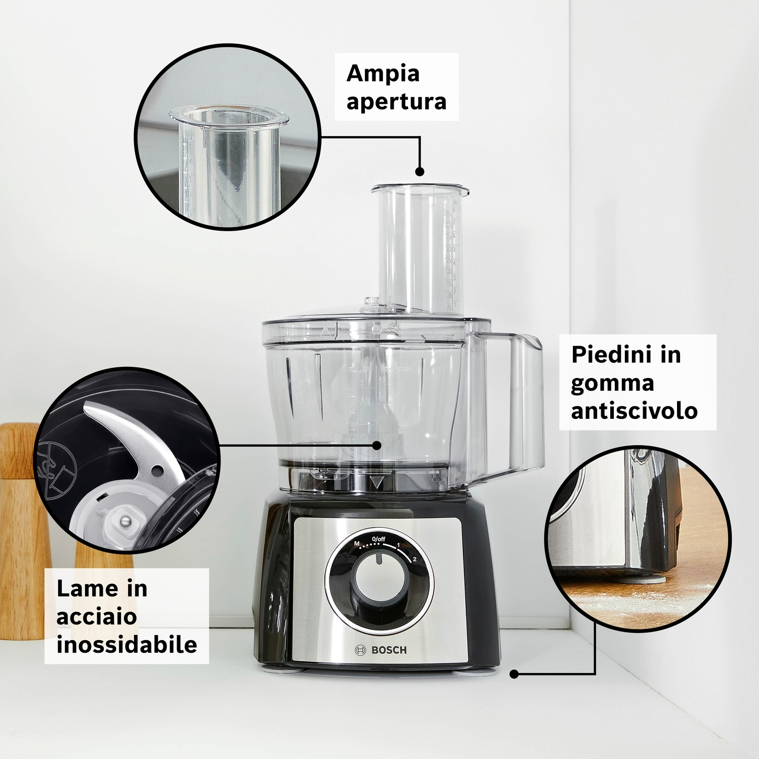 Un robot da cucina Bosch con lame in acciaio inox, ampia apertura e piedini in gomma.