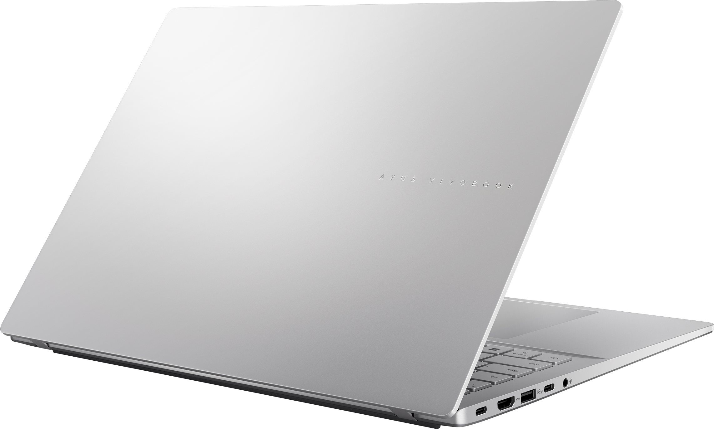Ein silberner Asus Vivobook Laptop ist geöffnet, mit Blick auf die Tastatur und Anschlüsse.