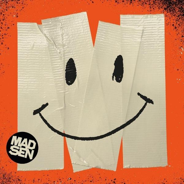 Ein Smiley aus Klebeband auf orangefarbenem Hintergrund.