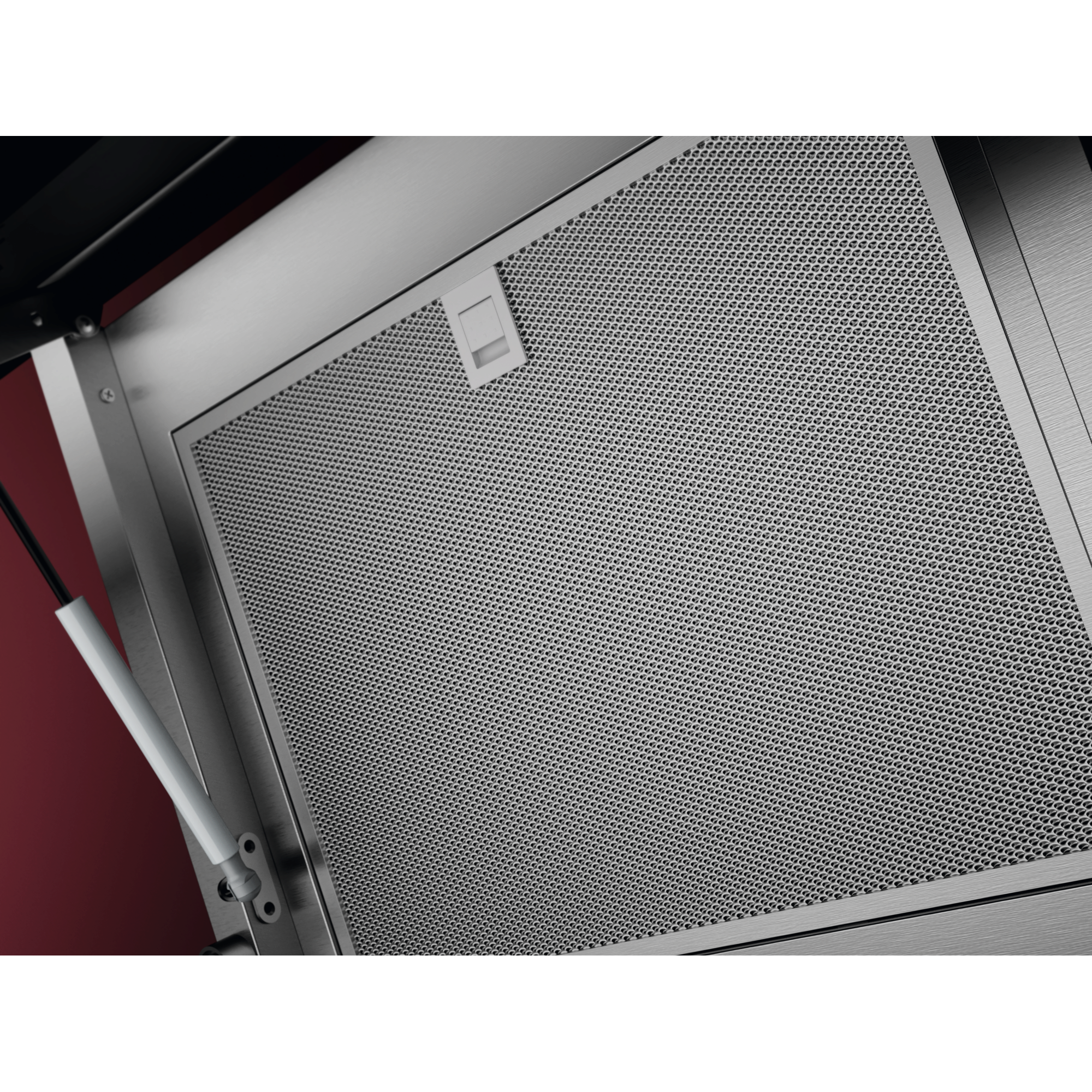 Edelstahl-Dunstabzugshaubenfilter mit feiner Perforation und Gasdruckfeder.
