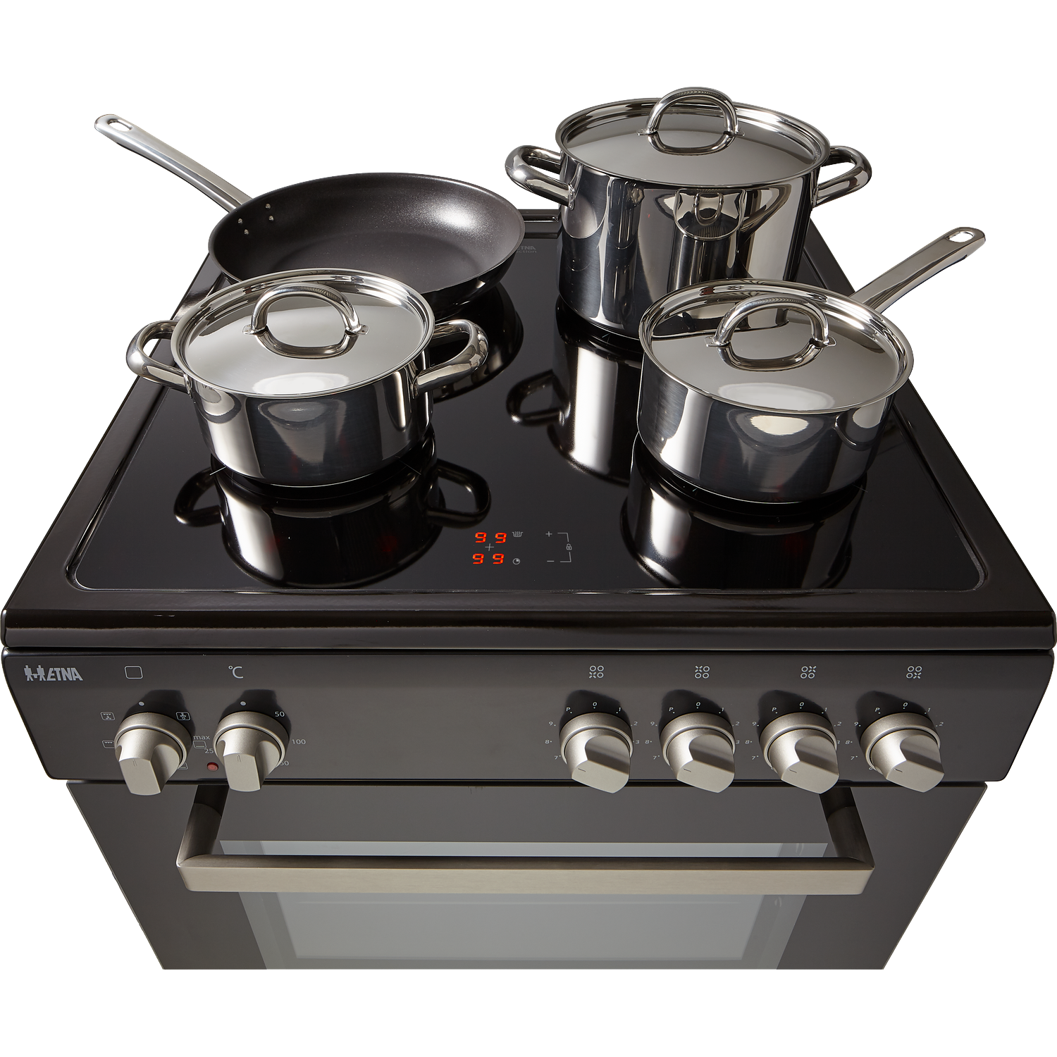 A black stove with four pots and a frying pan on the cooktop.