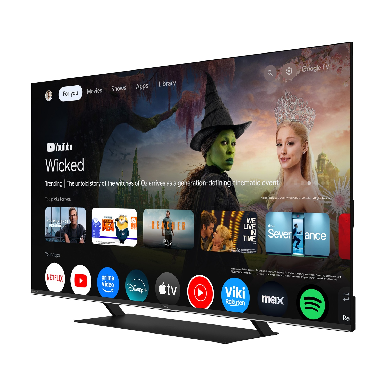 Una TV mostra la schermata principale di Google TV con trailer di film e app.