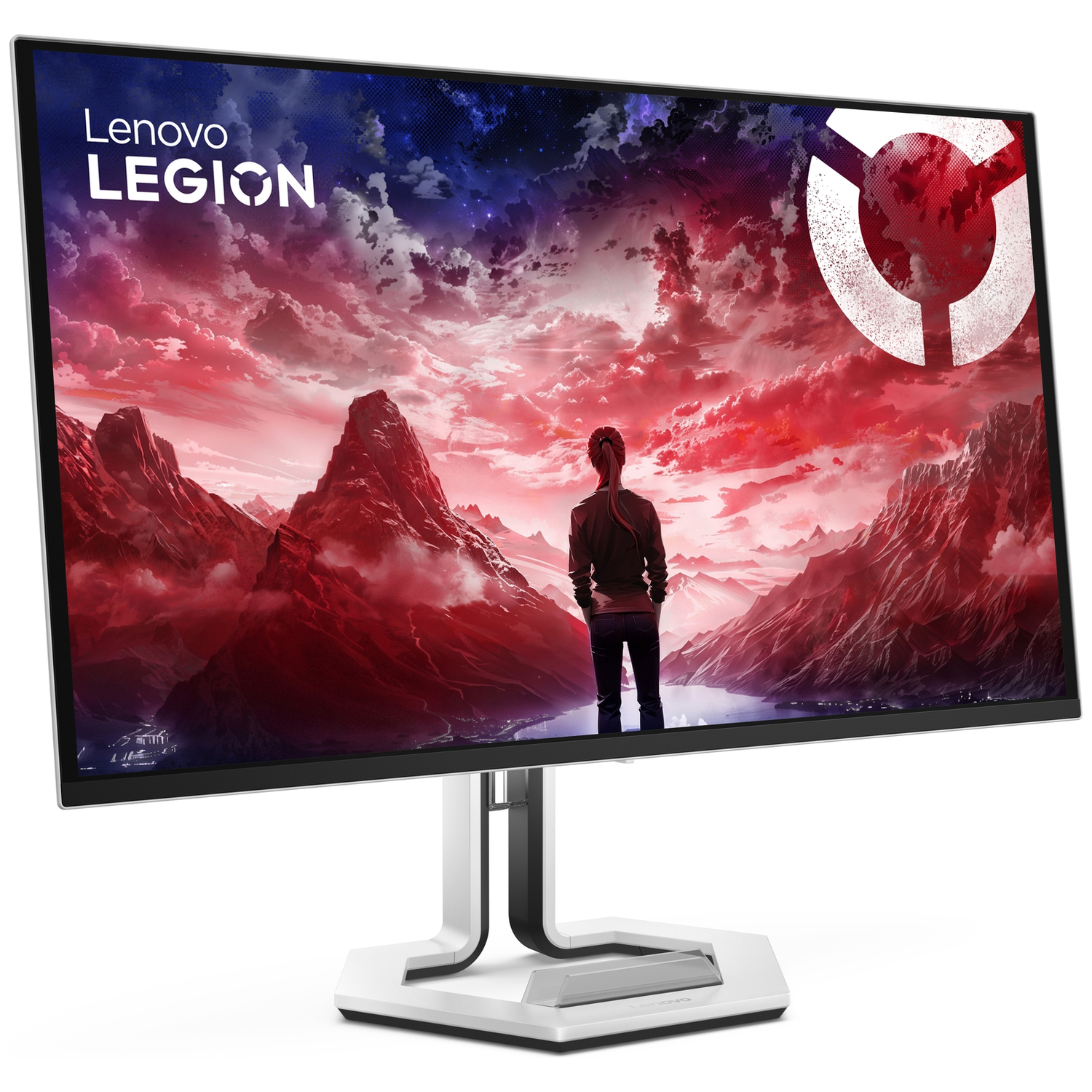 A gaming monitor displays a person against a landscape of red mountains and starry sky.