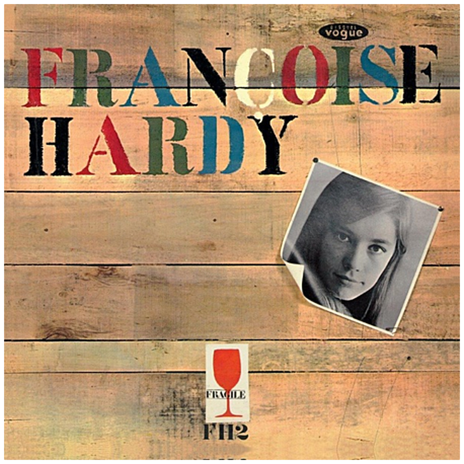 Françoise Hardy tekst op hout. Zwart-wit foto. Fragiel sticker.