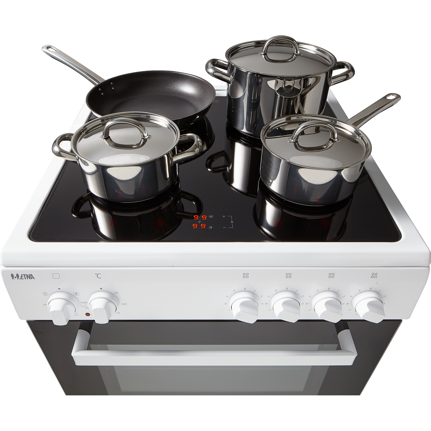 A white Etna stove with four stainless steel pots and one frying pan on a black glass cooktop.