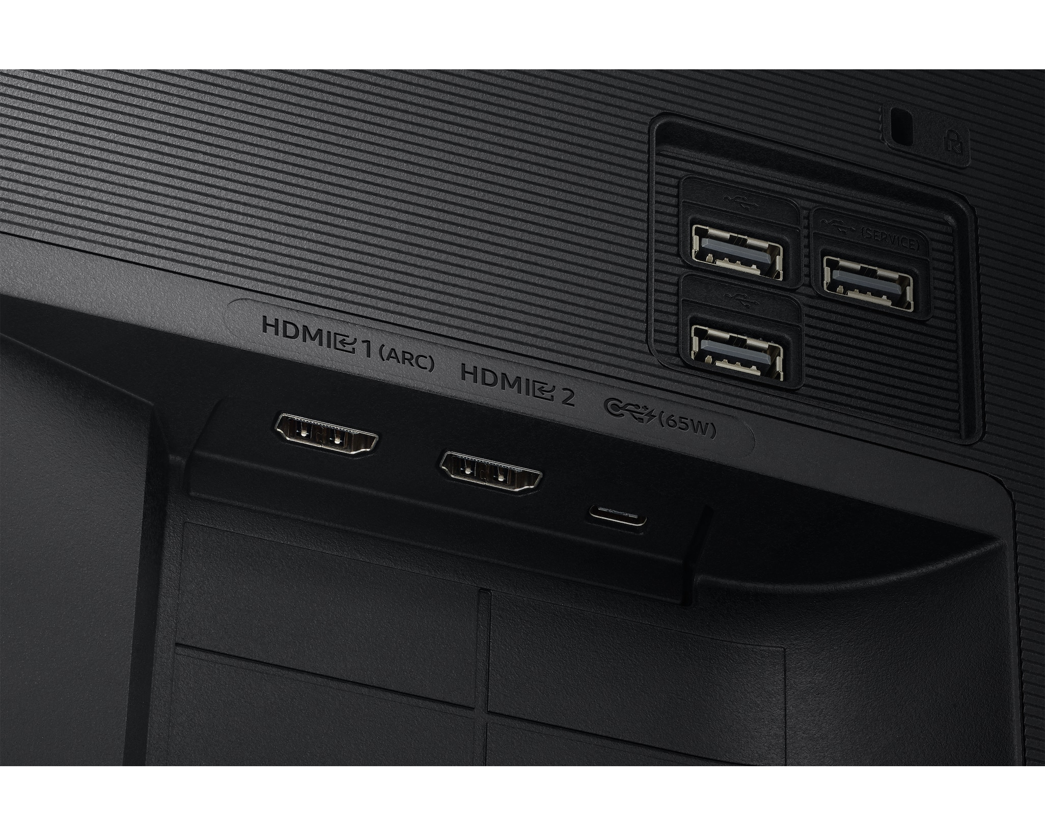 Panel połączeniowy z HDMI 1 (ARC), HDMI 2, portami USB i oznaczeniem 65W.