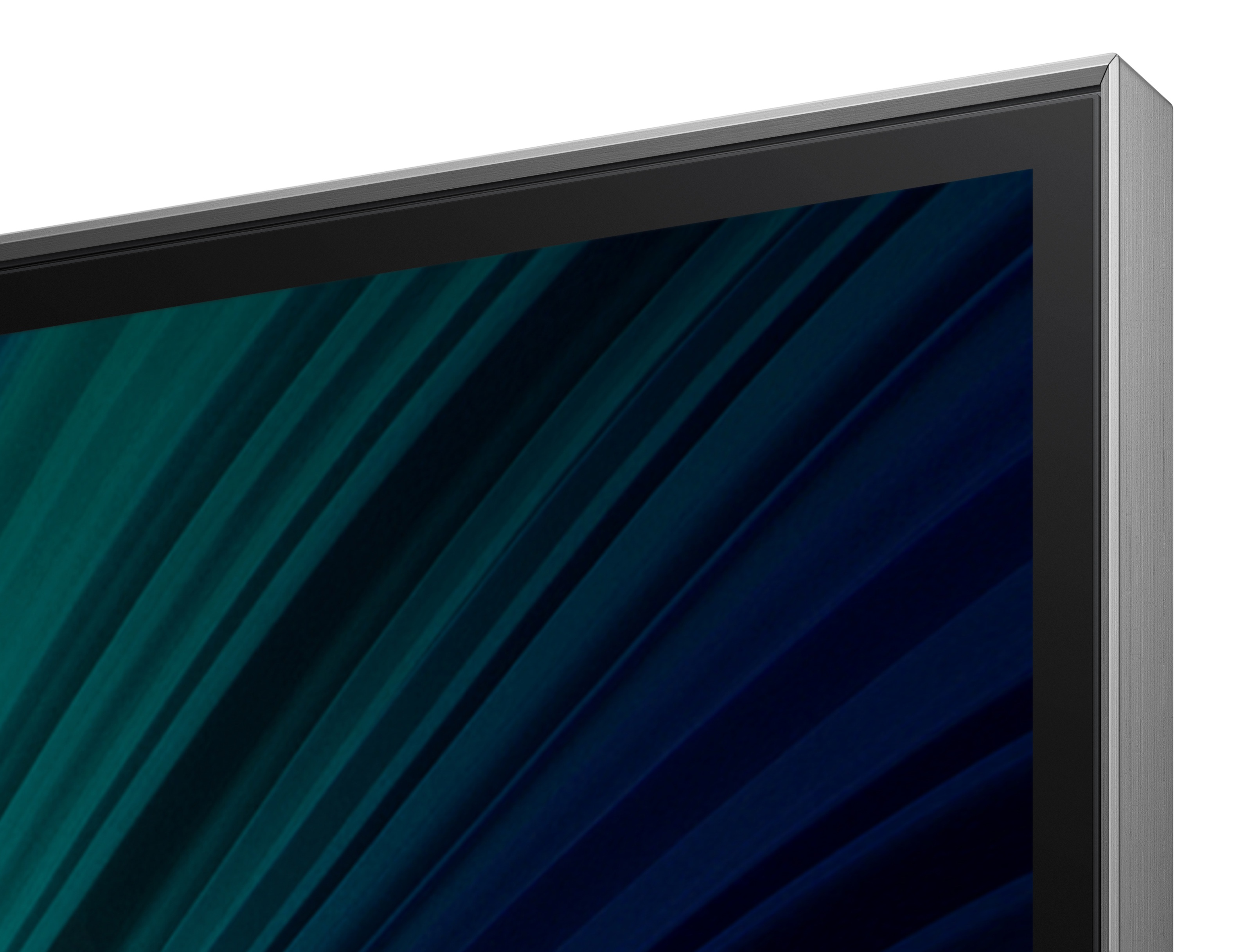 Zbliżenie srebrnej krawędzi telewizora z abstrakcyjnym niebiesko-zielonym tłem.