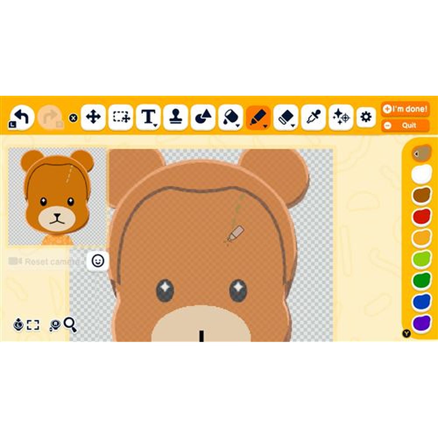 Un ours est créé sur un écran. Des outils et des couleurs sont visibles.