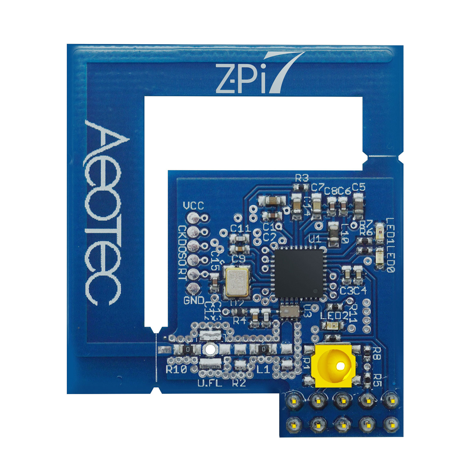 Eine blaue Platine mit der Aufschrift "ZPi" und "AeoTec". Sie hat viele elektronische Komponenten.