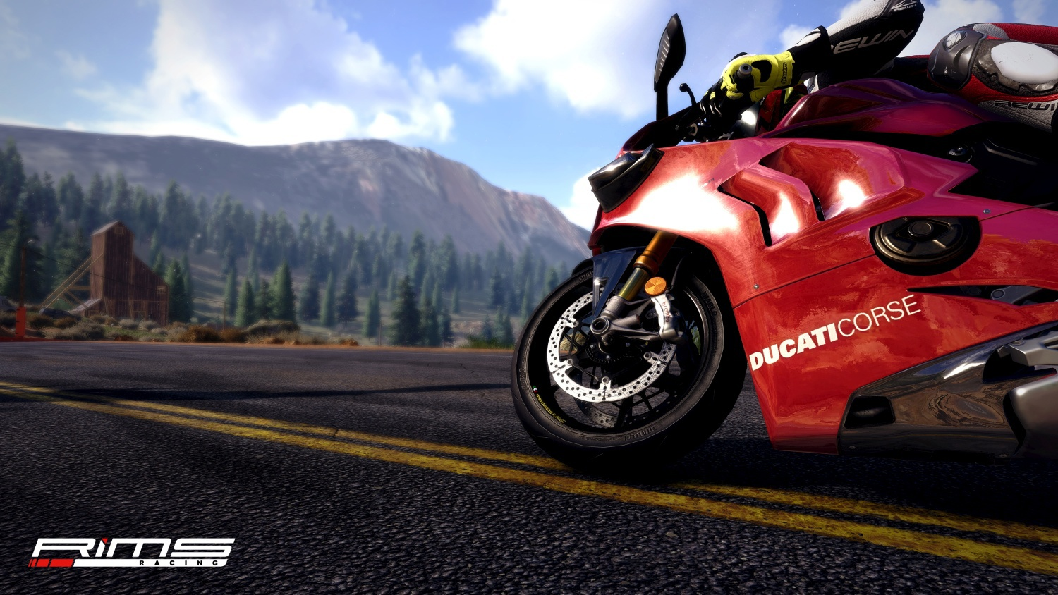 Moto rouge Ducati Corse sur route asphaltée, lignes jaunes, montagnes et arbres.